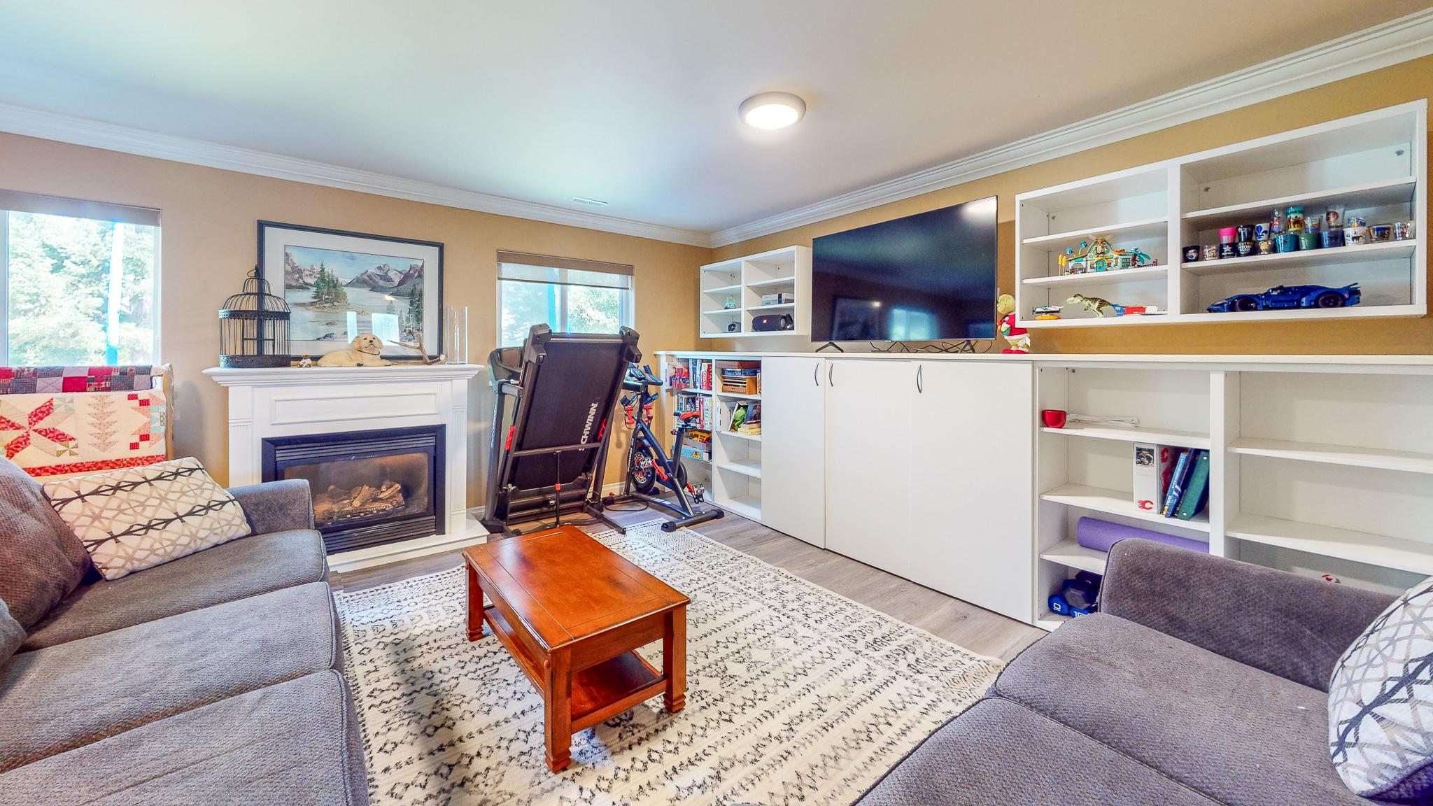 112 11Th Street, Cranbrook, BC - Indoor Photo Showing Living Room With Fireplace