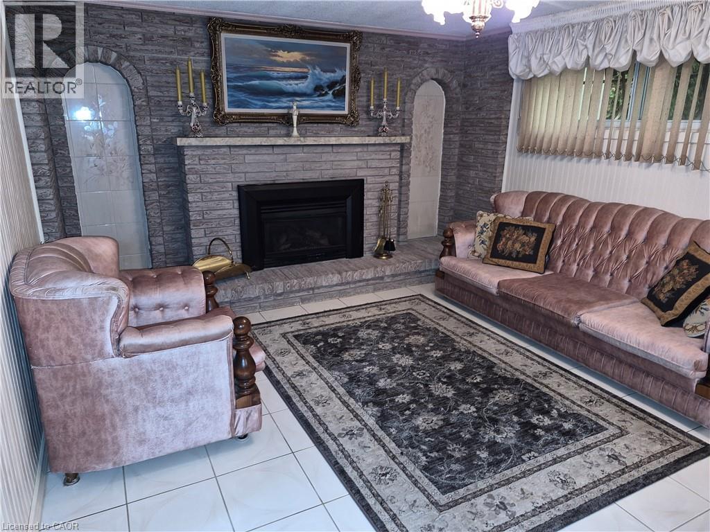 11 Fassett Avenue, Hamilton, ON - Indoor Photo Showing Living Room With Fireplace