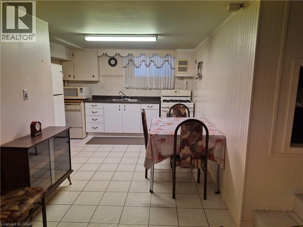 11 Fassett Avenue, Hamilton, ON - Indoor Photo Showing Kitchen With Double Sink