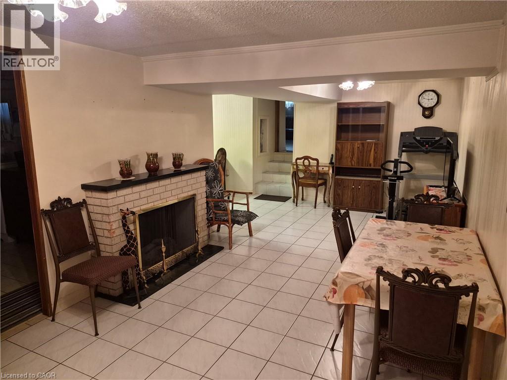 11 Fassett Avenue, Hamilton, ON - Indoor With Fireplace