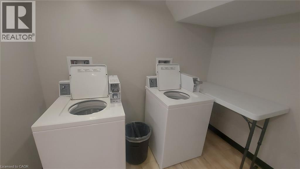 Laundry room (2 washing machines and 2 dryer machines) - 181 King Street E Unit# 2, Kitchener, ON