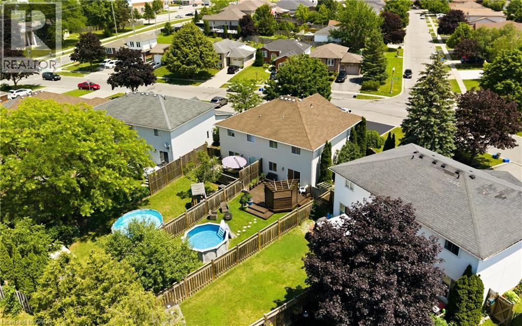 Aerial perspective showcasing a residential neighborhood with detached homes - 16 Scottacres Boulevard, Caledonia, ON