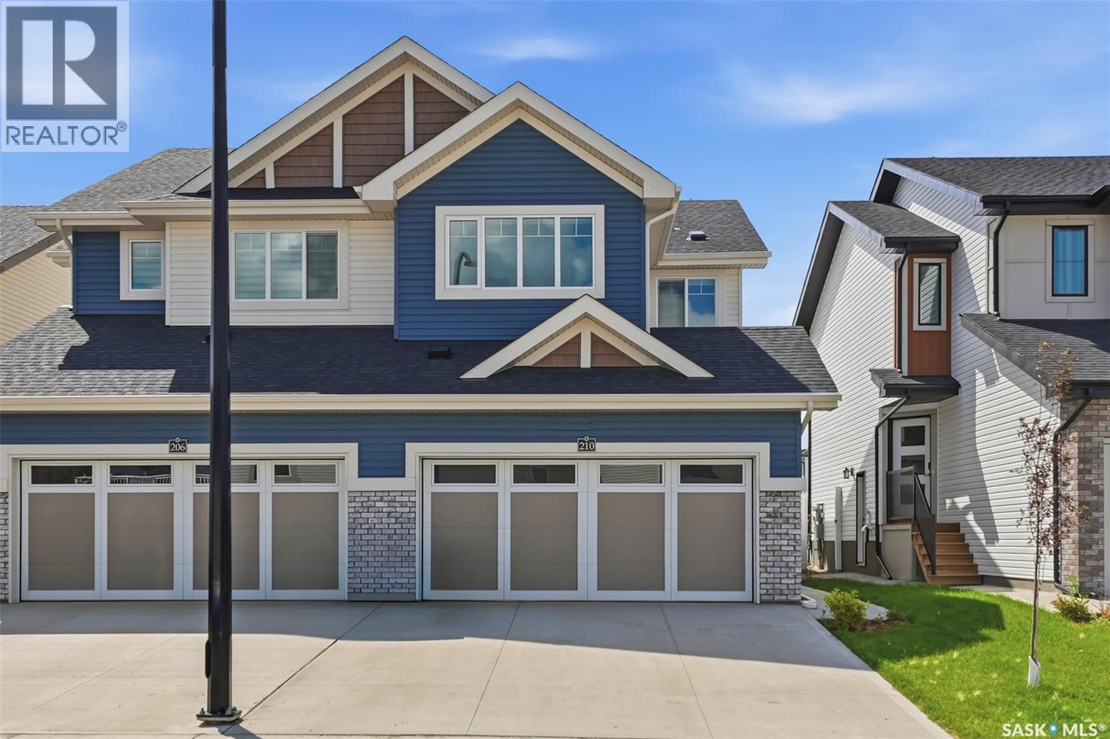210 Schmeiser Bend, Saskatoon, SK - Outdoor With Facade