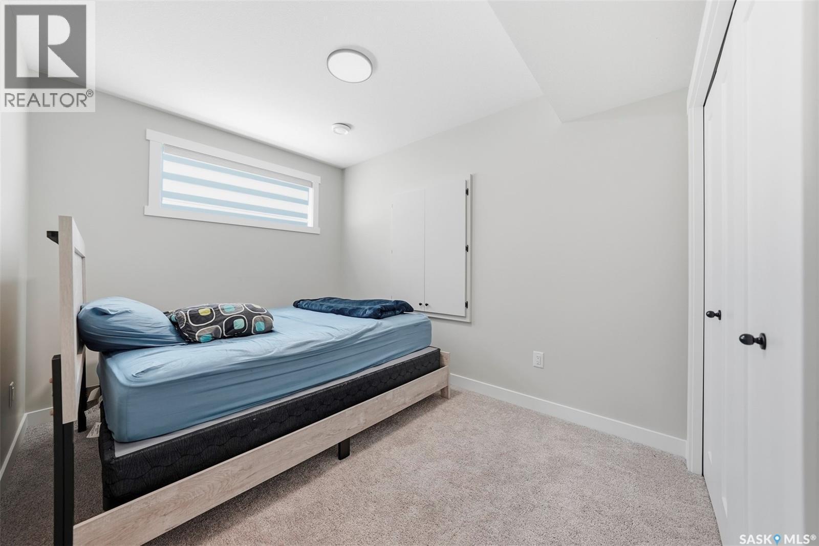 210 Schmeiser Bend, Saskatoon, SK - Indoor Photo Showing Bedroom