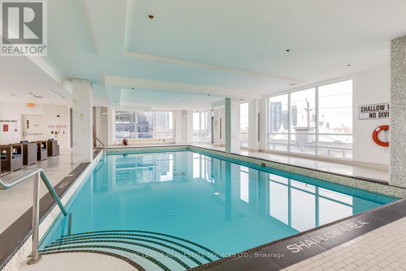203 - 16 Brookers Lane, Toronto, ON - Indoor Photo Showing Other Room With In Ground Pool