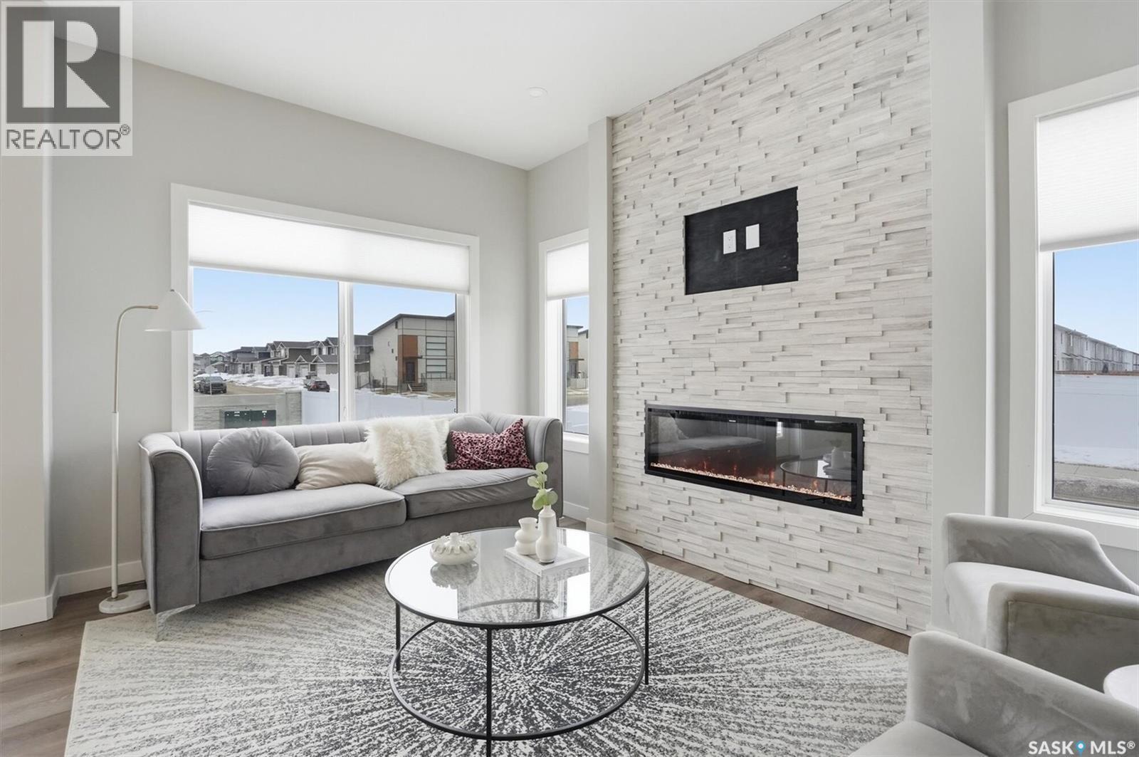 442 Leskiw Bend, Saskatoon, SK - Indoor Photo Showing Living Room With Fireplace