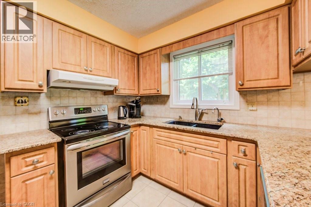 94 Mccarron Crescent, Waterloo, ON - Indoor Photo Showing Kitchen With Double Sink