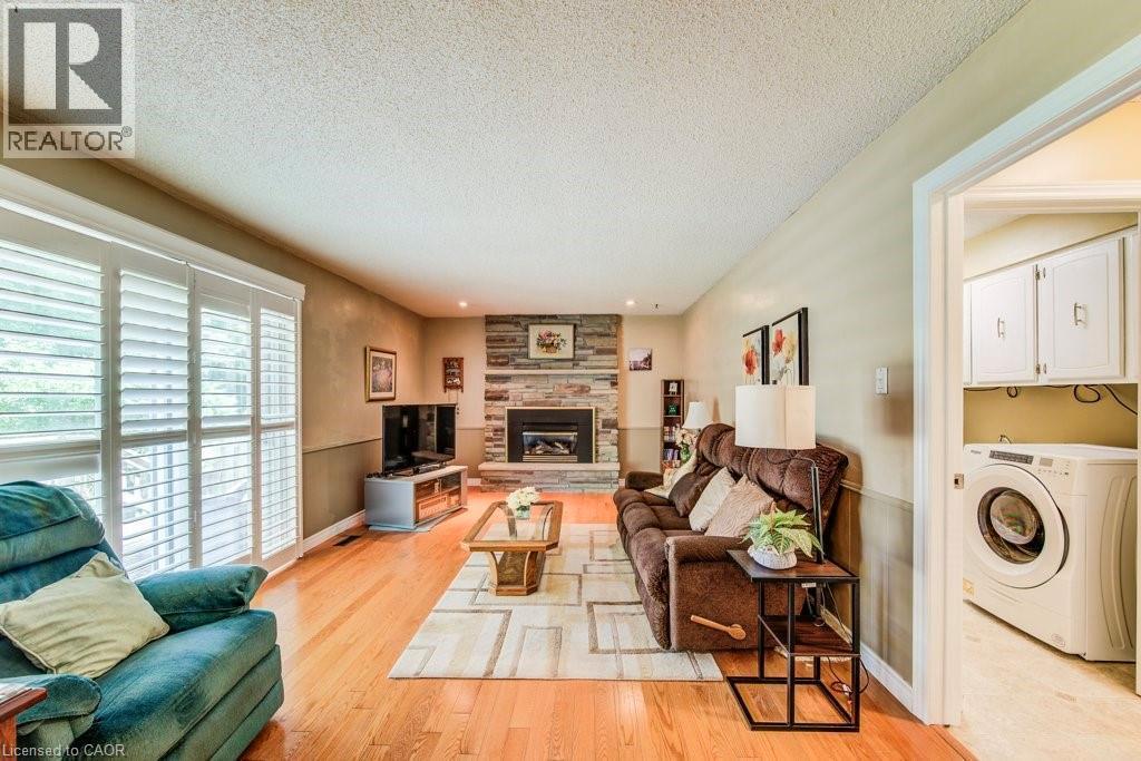 94 Mccarron Crescent, Waterloo, ON - Indoor Photo Showing Living Room With Fireplace