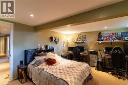Carpeted room featuring recessed lighting and a neutral color palette - 