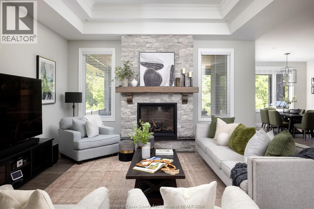 6005 Silver Maple Road, Lasalle, ON - Indoor Photo Showing Living Room With Fireplace