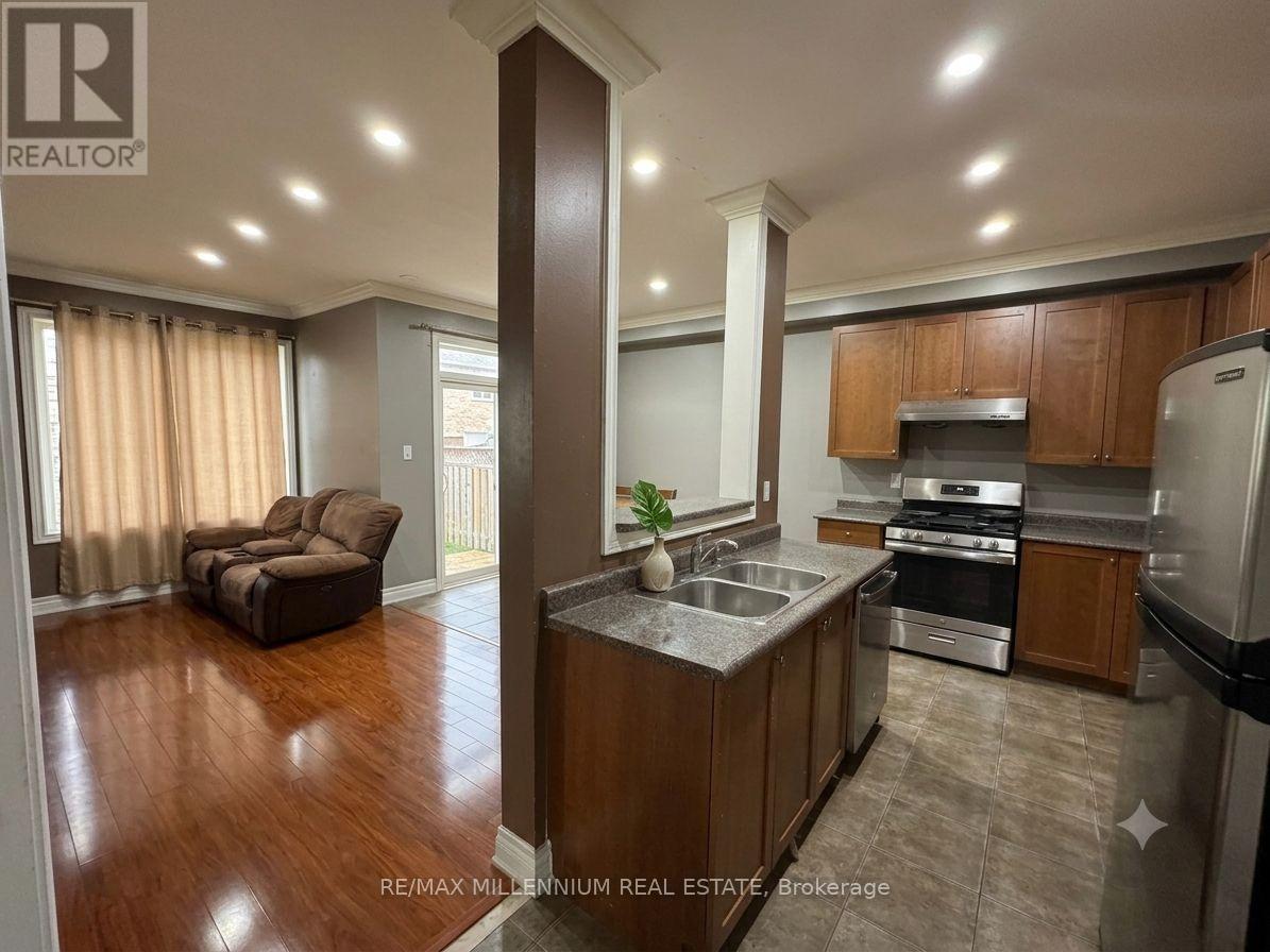 Upper - 33 Nomad Crescent, Brampton, ON - Indoor Photo Showing Kitchen With Double Sink
