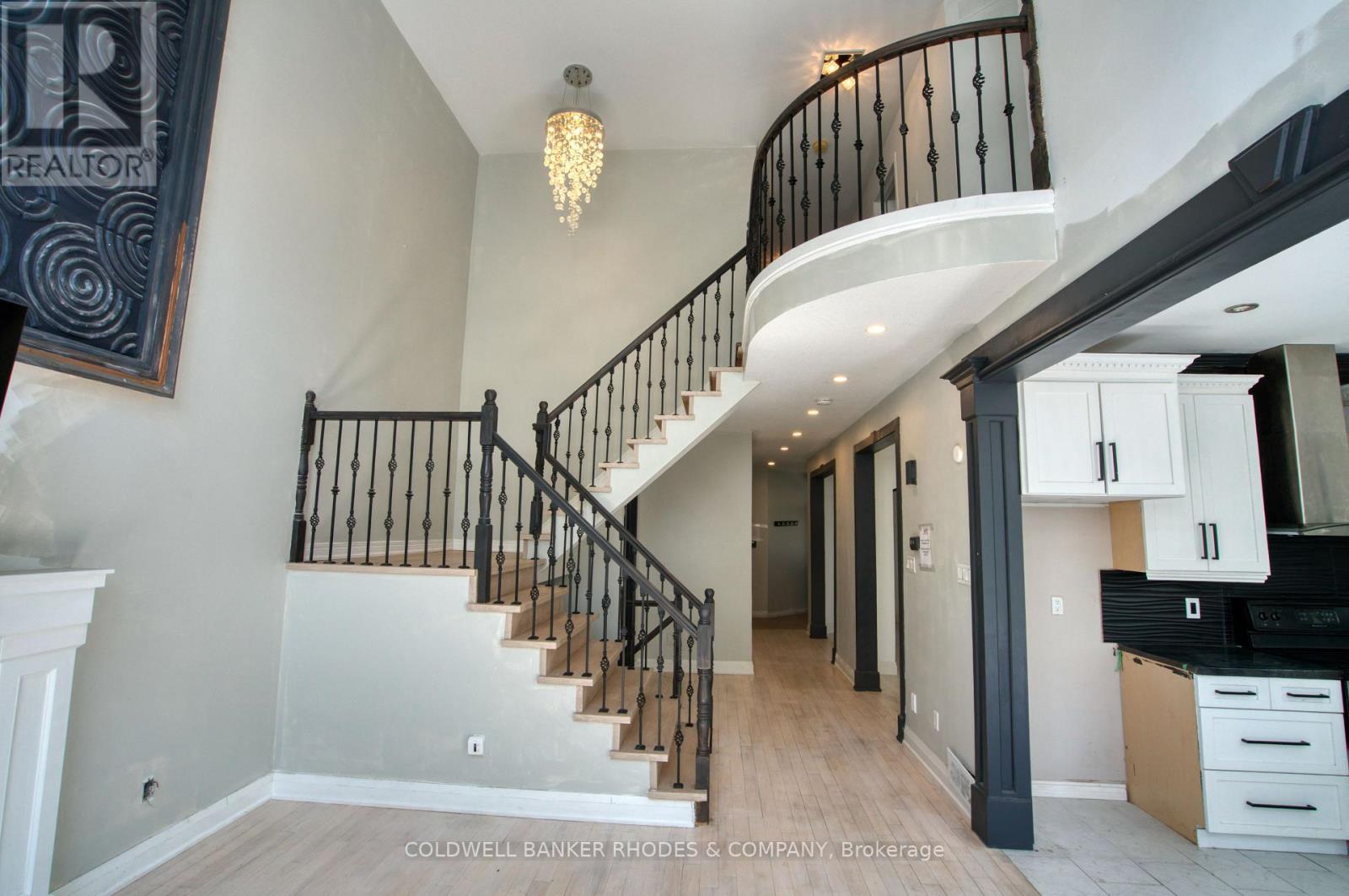 Elegant staircase to second floor - 32 Catterick Crescent, Ottawa, ON