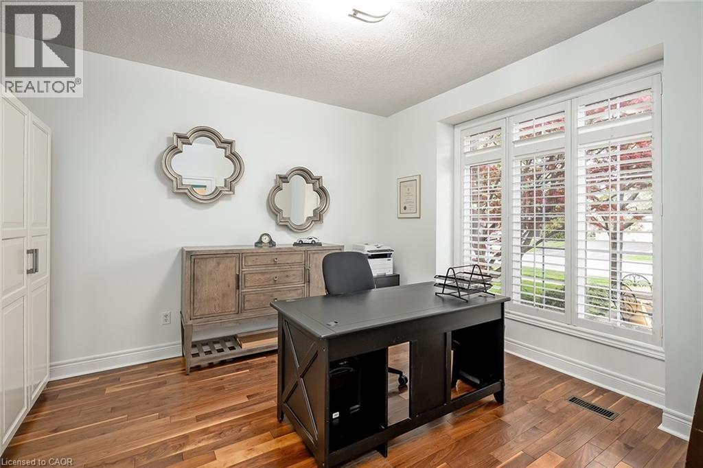 Bedroom at the front of the house with an adjacent full bath - 4285 Couples Crescent, Burlington, ON - Indoor Photo Showing Office