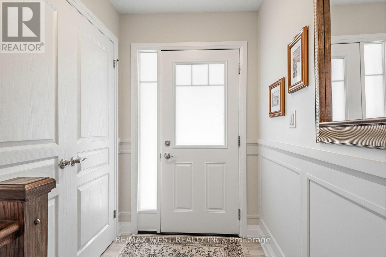 113 Dory Row - Entrance Door + Closet - 113 Dory Row, Blue Mountains, ON - Indoor Photo Showing Other Room