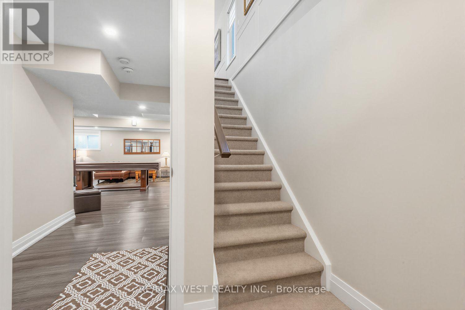 113 Dory Row - Stairs to Basement/Rec Room - 113 Dory Row, Blue Mountains, ON - Indoor Photo Showing Other Room