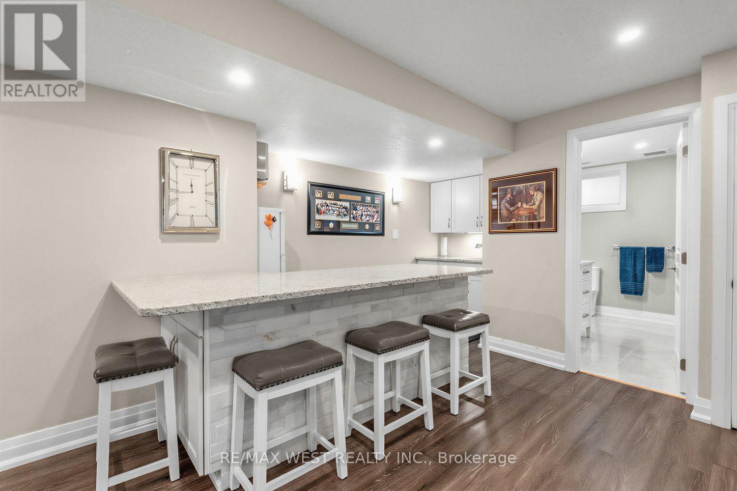 113 Dory Row - Kitchen with Breakfast Bar - 113 Dory Row, Blue Mountains, ON - Indoor Photo Showing Other Room