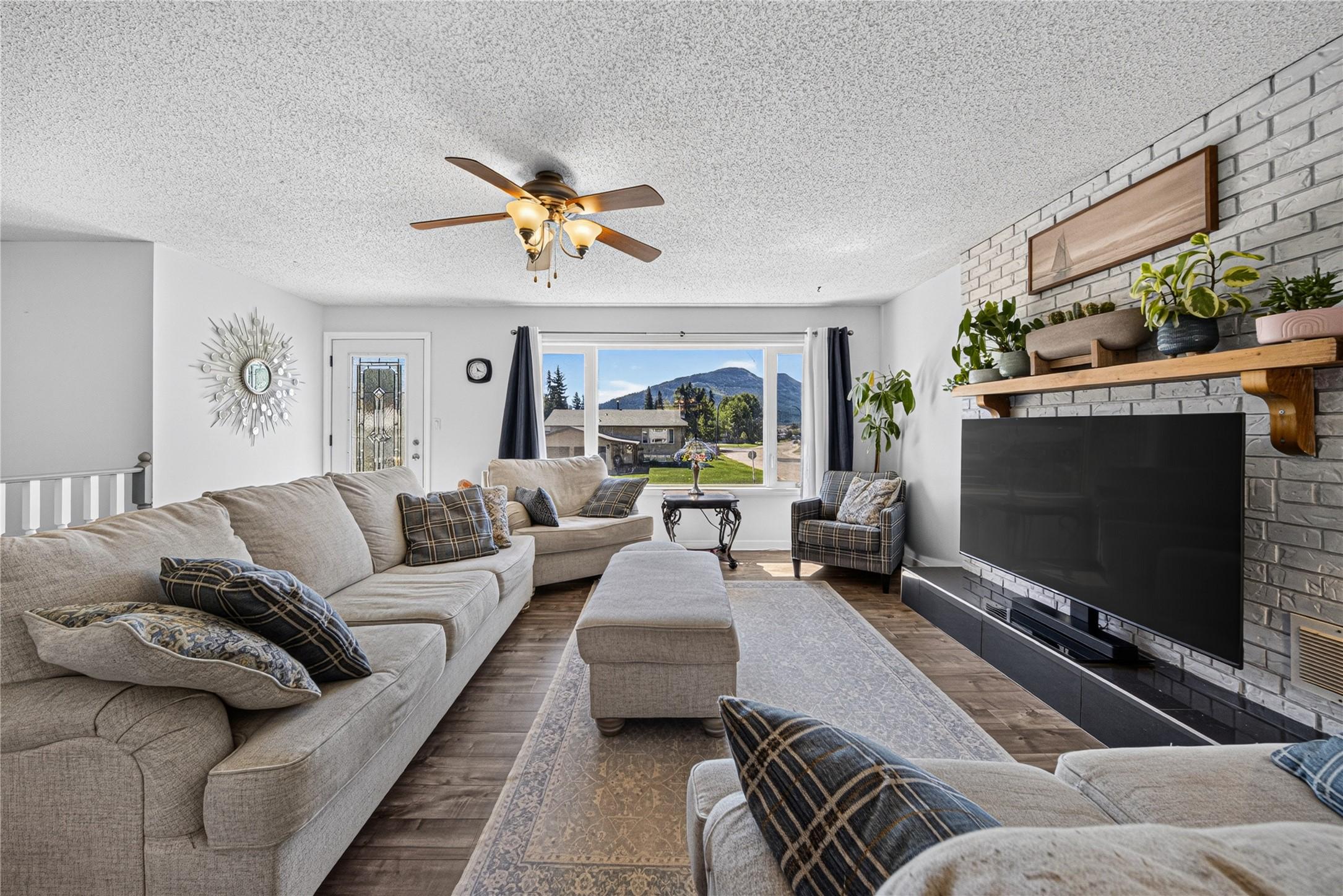 1386 Cypress Drive, Sparwood, BC - Indoor Photo Showing Living Room With Fireplace