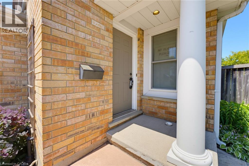 Brick exterior with a covered entry - 520 Mayflower Street, Waterloo, ON - Outdoor With Exterior