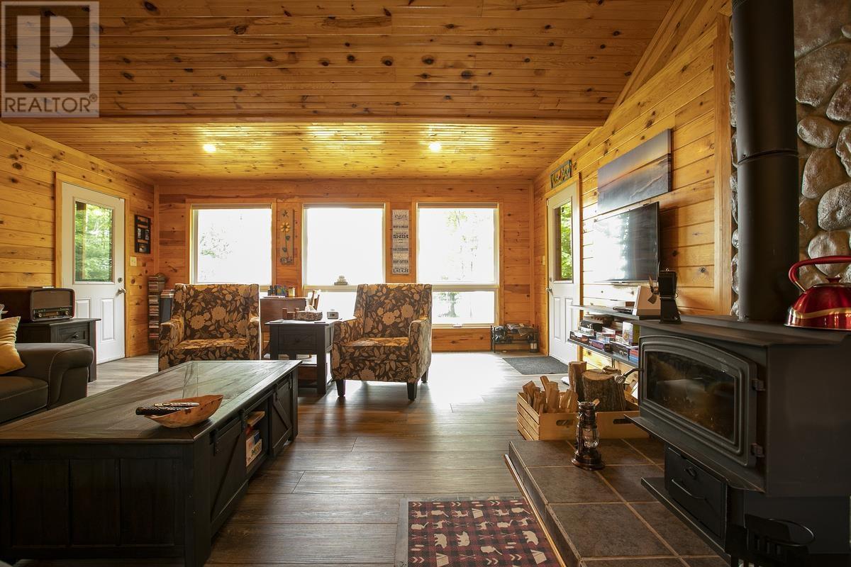 30A Stoney Point Rd, Batchawana Bay, ON - Indoor Photo Showing Living Room With Fireplace