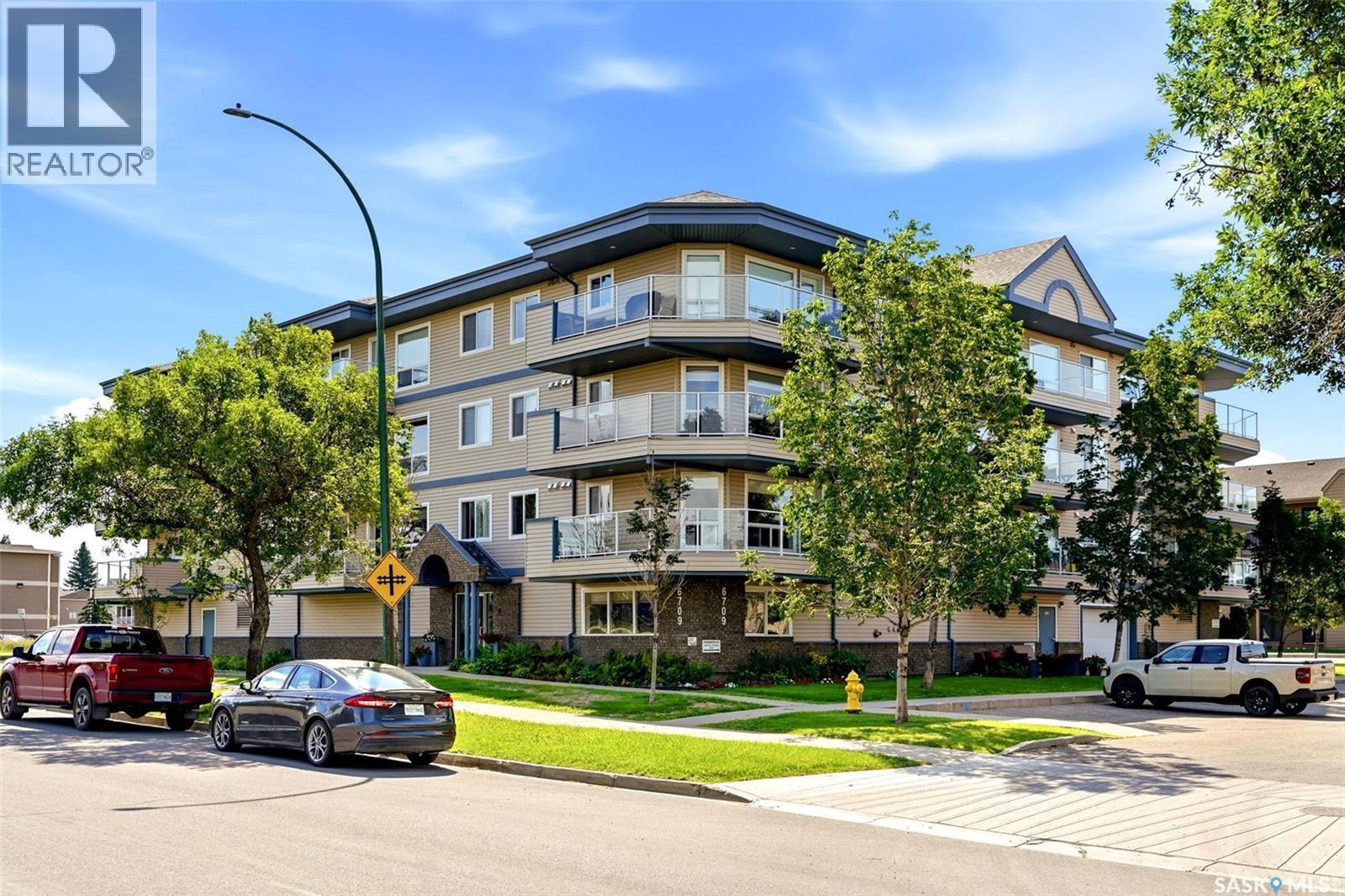 303 6709 Rochdale Boulevard, Regina, SK - Outdoor With Balcony With Facade