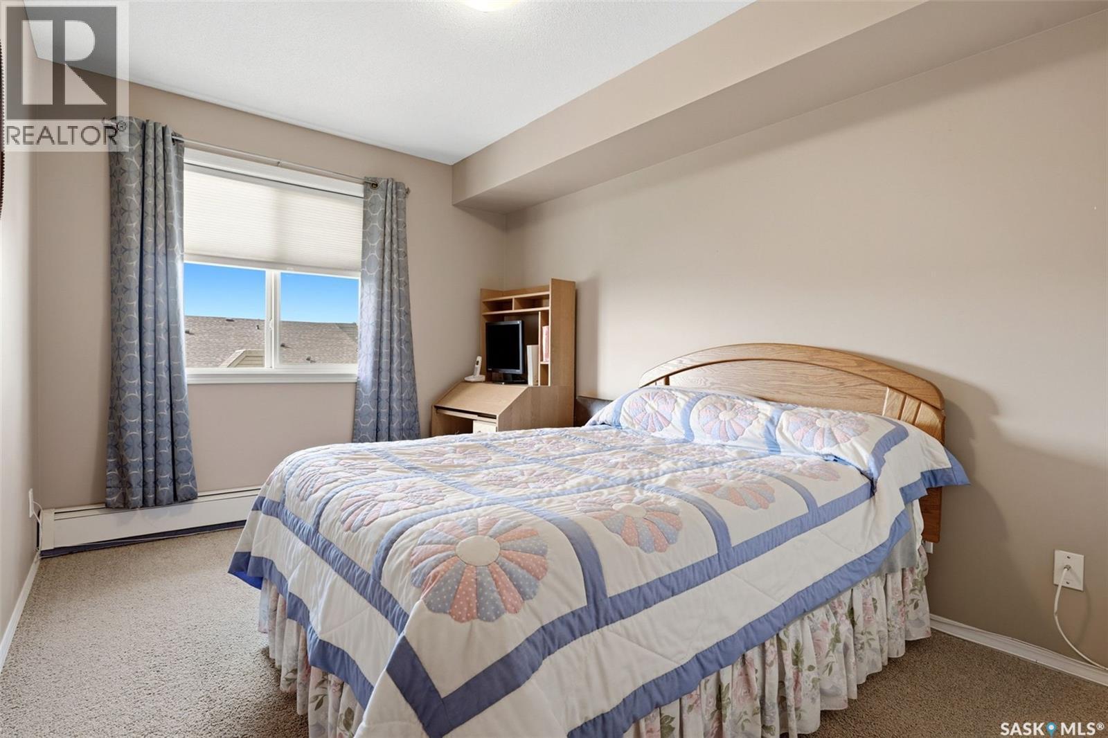 303 6709 Rochdale Boulevard, Regina, SK - Indoor Photo Showing Bedroom
