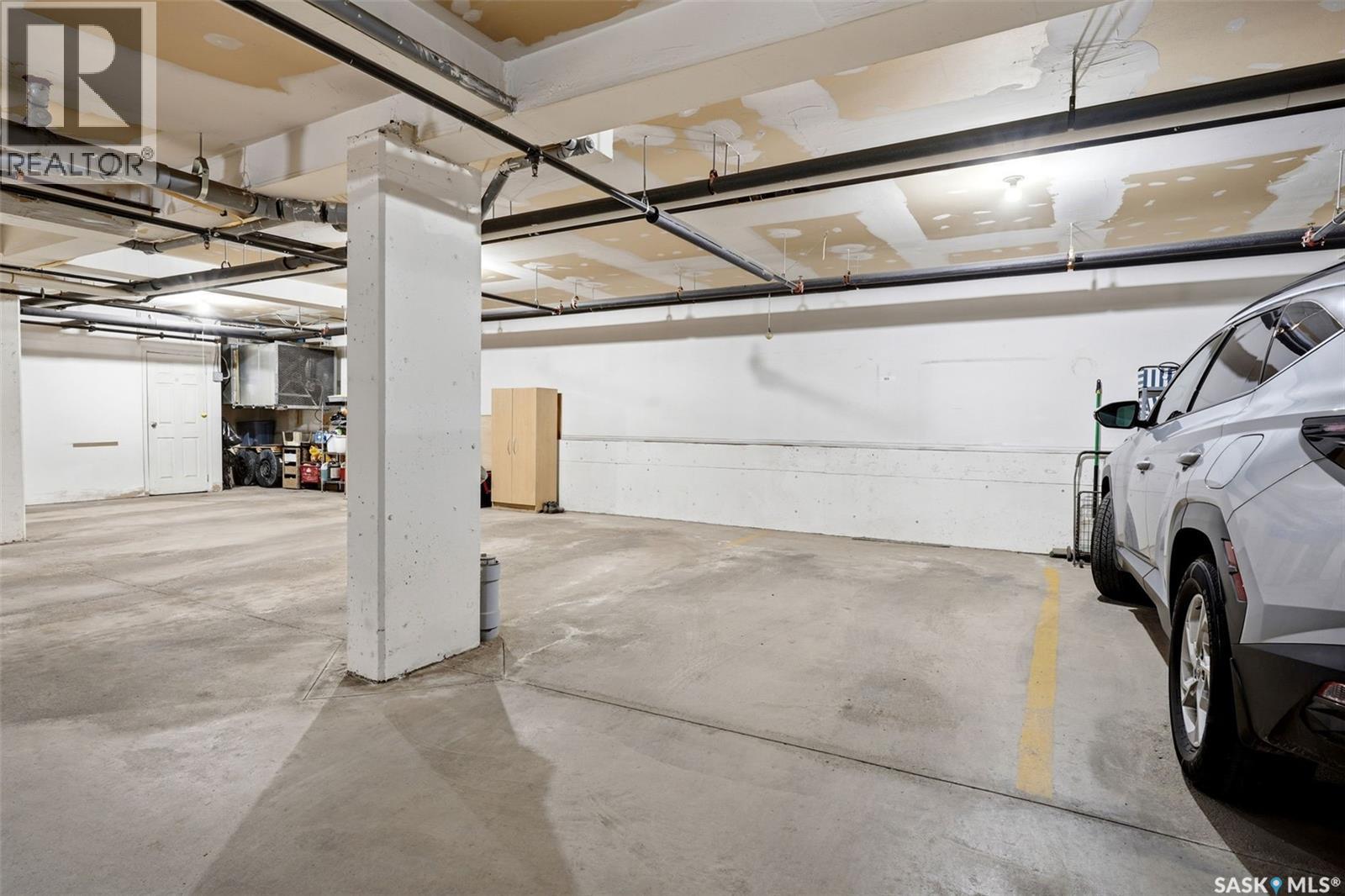 303 6709 Rochdale Boulevard, Regina, SK - Indoor Photo Showing Garage