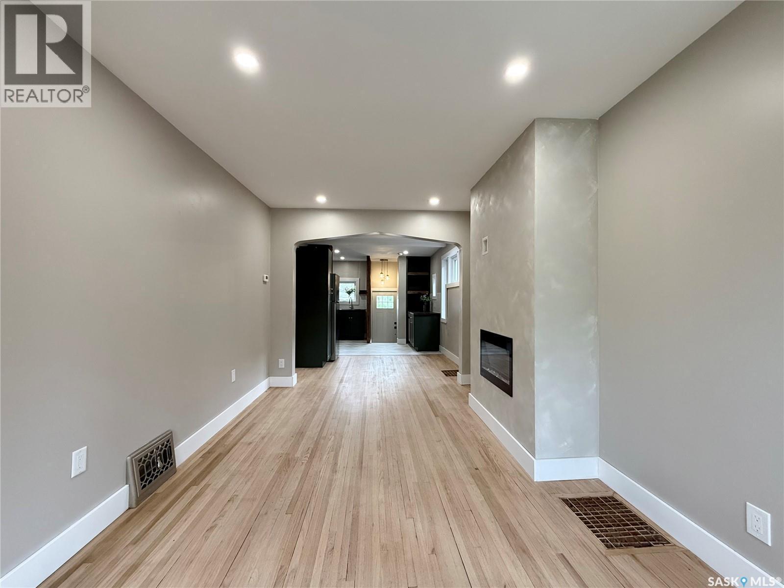 2471 Broder Street, Regina, SK - Indoor Photo Showing Other Room With Fireplace