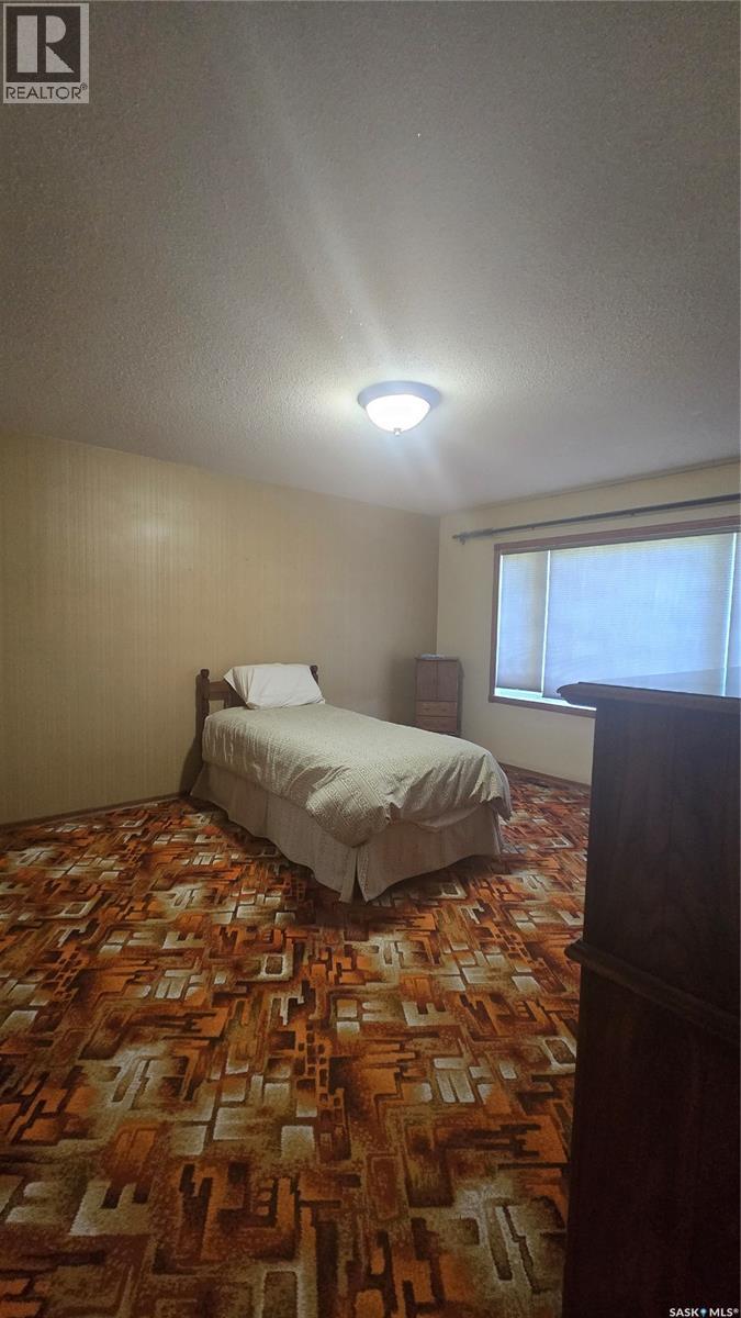 61 Moir Drive, Oxbow, SK - Indoor Photo Showing Bedroom