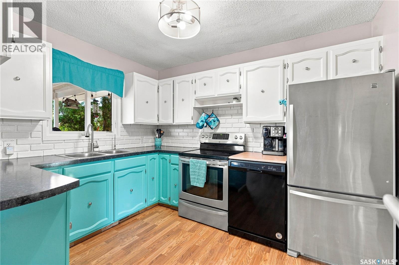 Thorhaug Acreage, Leask Rm No. 464, SK - Indoor Photo Showing Kitchen With Double Sink