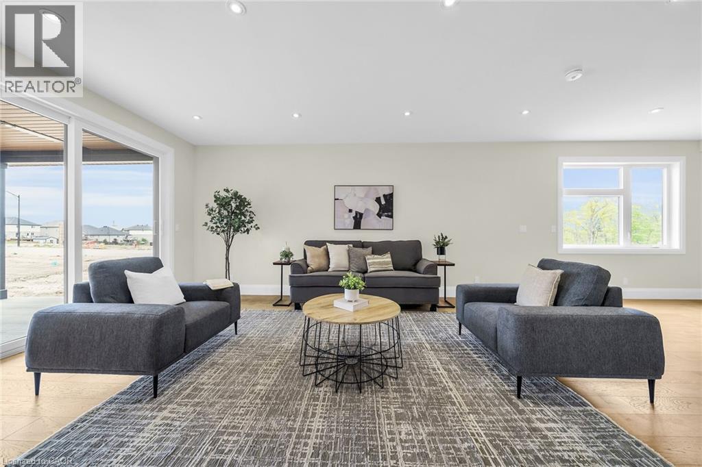 Photo from Cayuga Dedrick Model - Photo for illustration purposes only - 92 Craddock Boulevard, Jarvis, ON - Indoor Photo Showing Living Room
