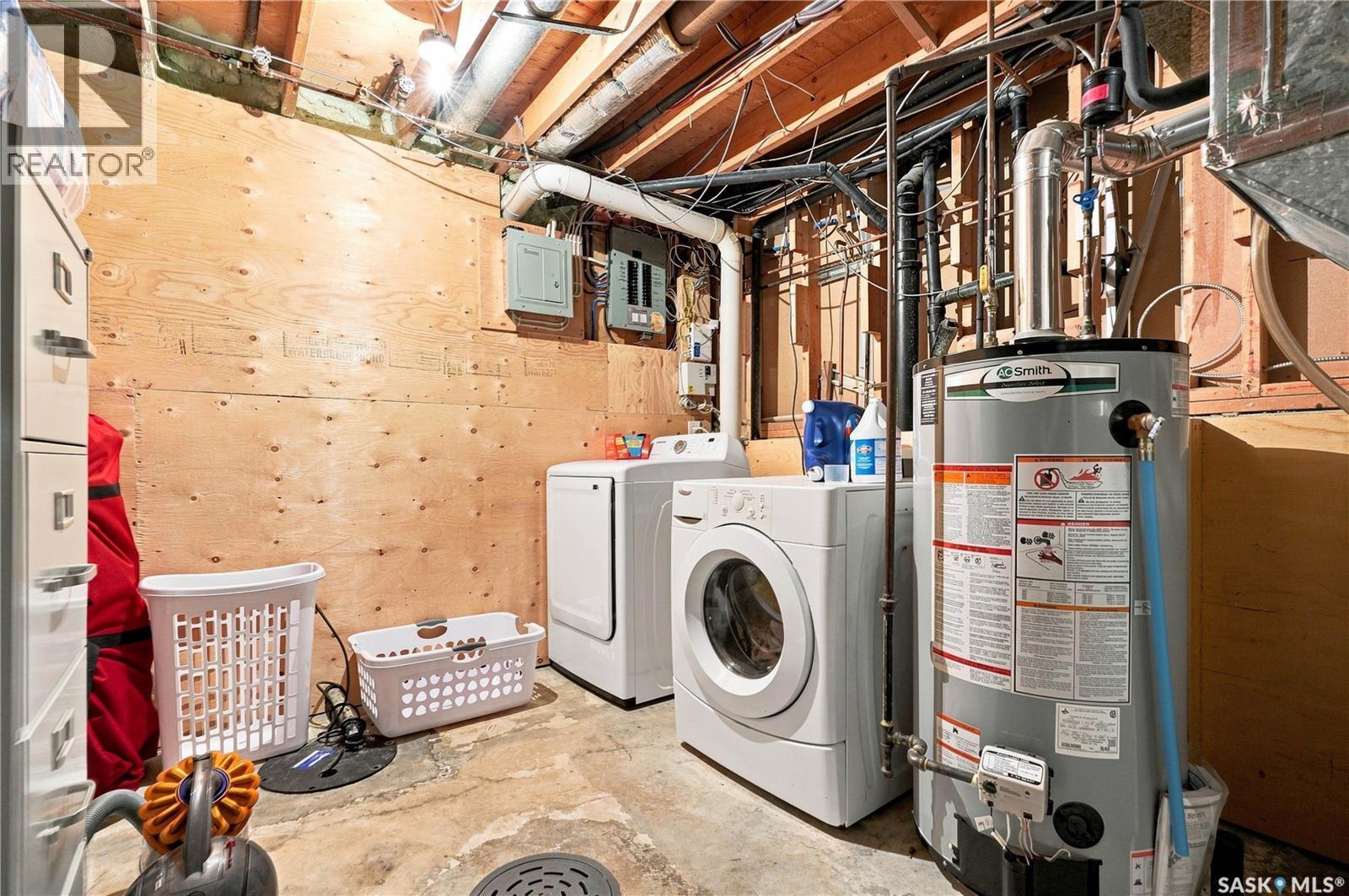 242 Candle Crescent, Saskatoon, SK - Indoor Photo Showing Laundry Room