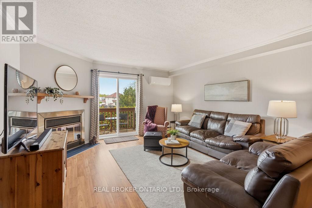 51 Haxby Private, Ottawa, ON - Indoor Photo Showing Living Room With Fireplace