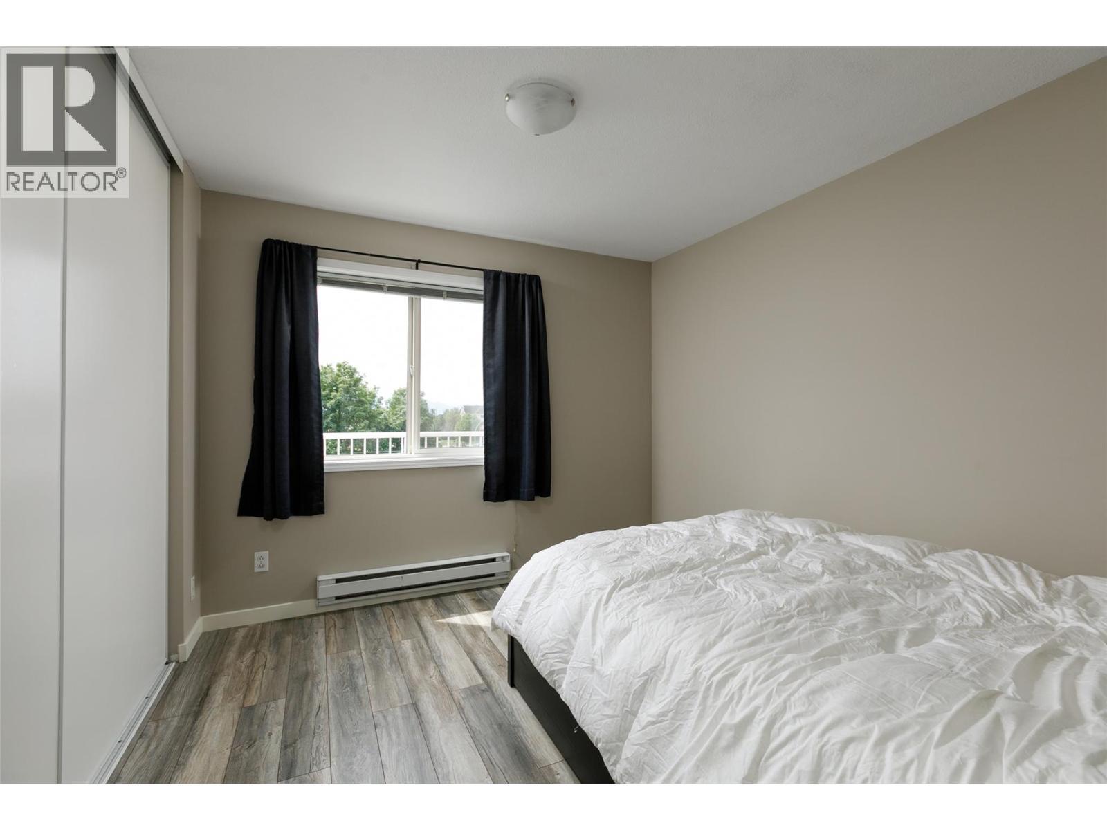 400 Sutton Crescent Unit# 313, Kelowna, BC - Indoor Photo Showing Bedroom
