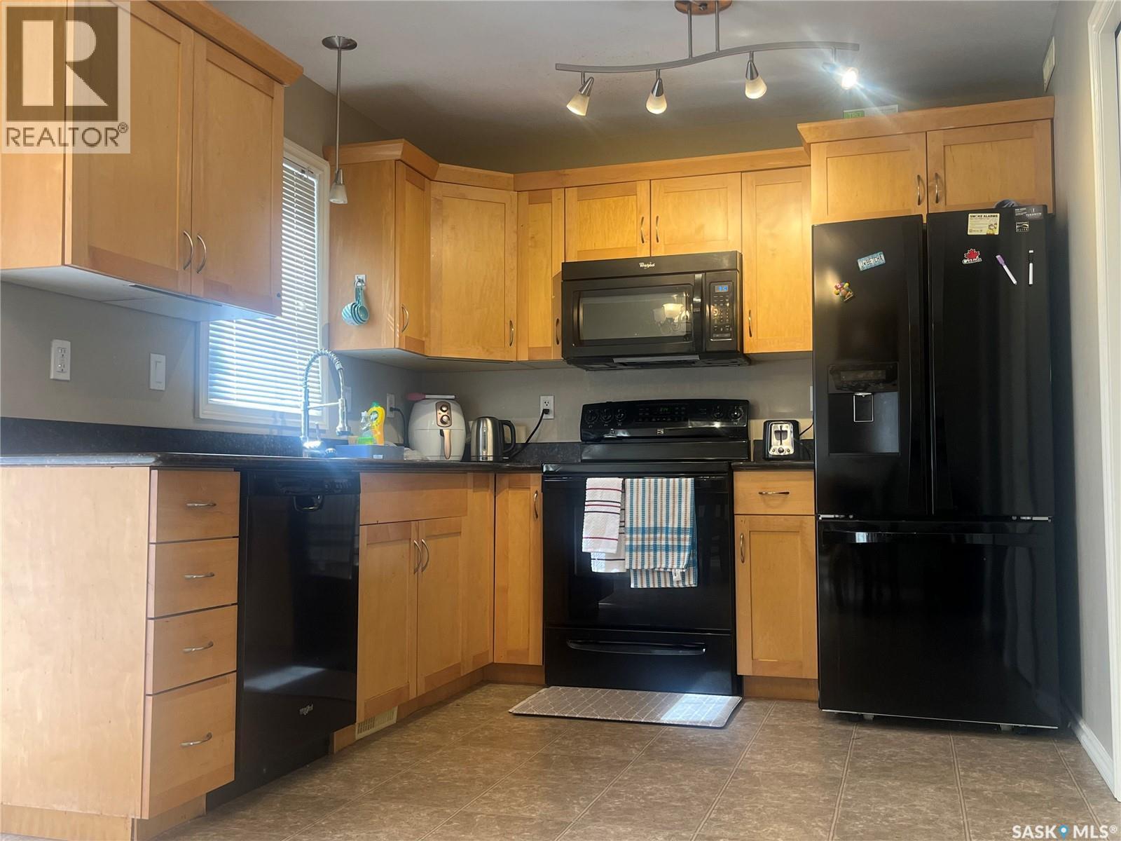 207 303 Slimmon Place, Saskatoon, SK - Indoor Photo Showing Kitchen
