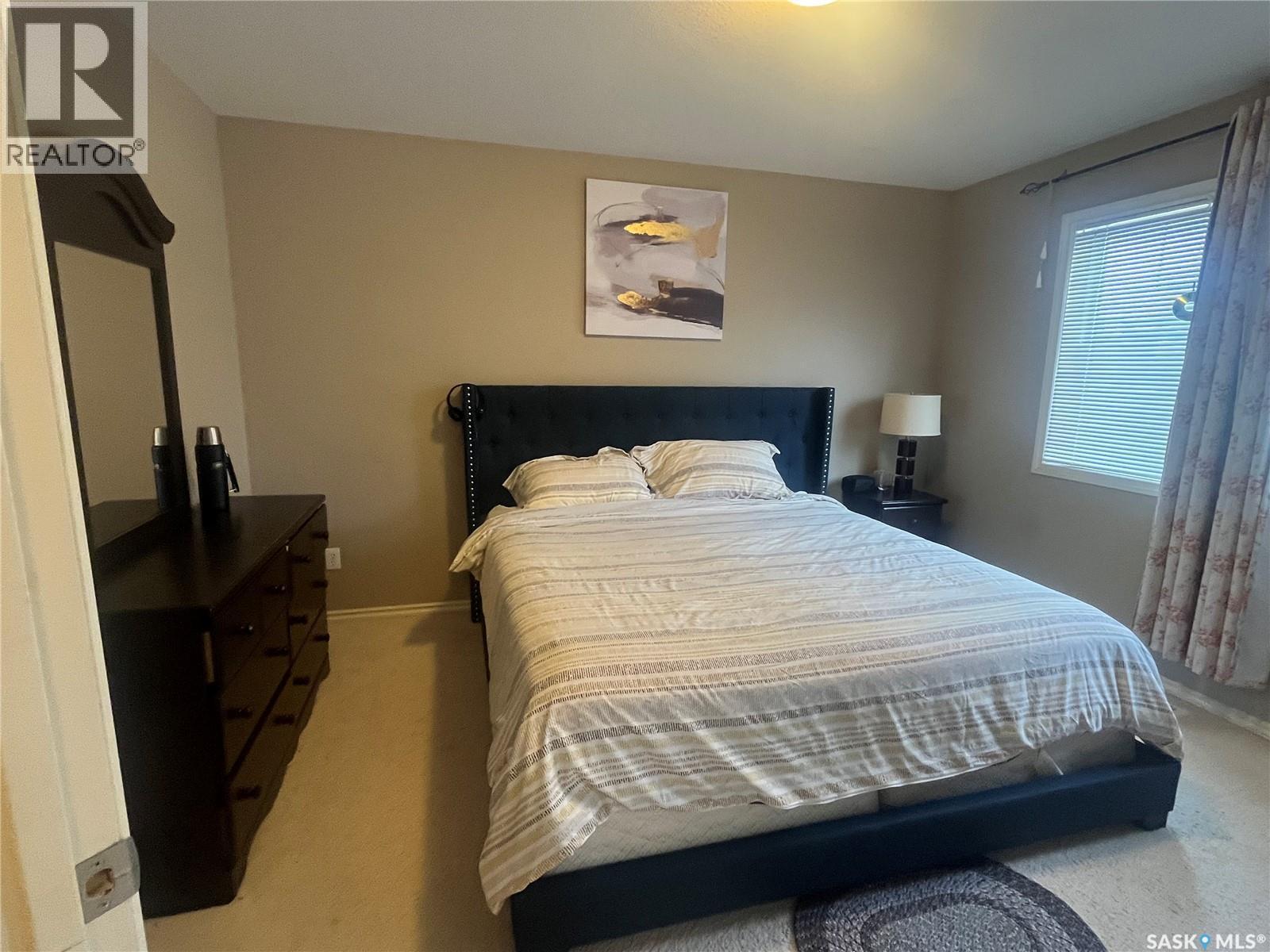 207 303 Slimmon Place, Saskatoon, SK - Indoor Photo Showing Bedroom
