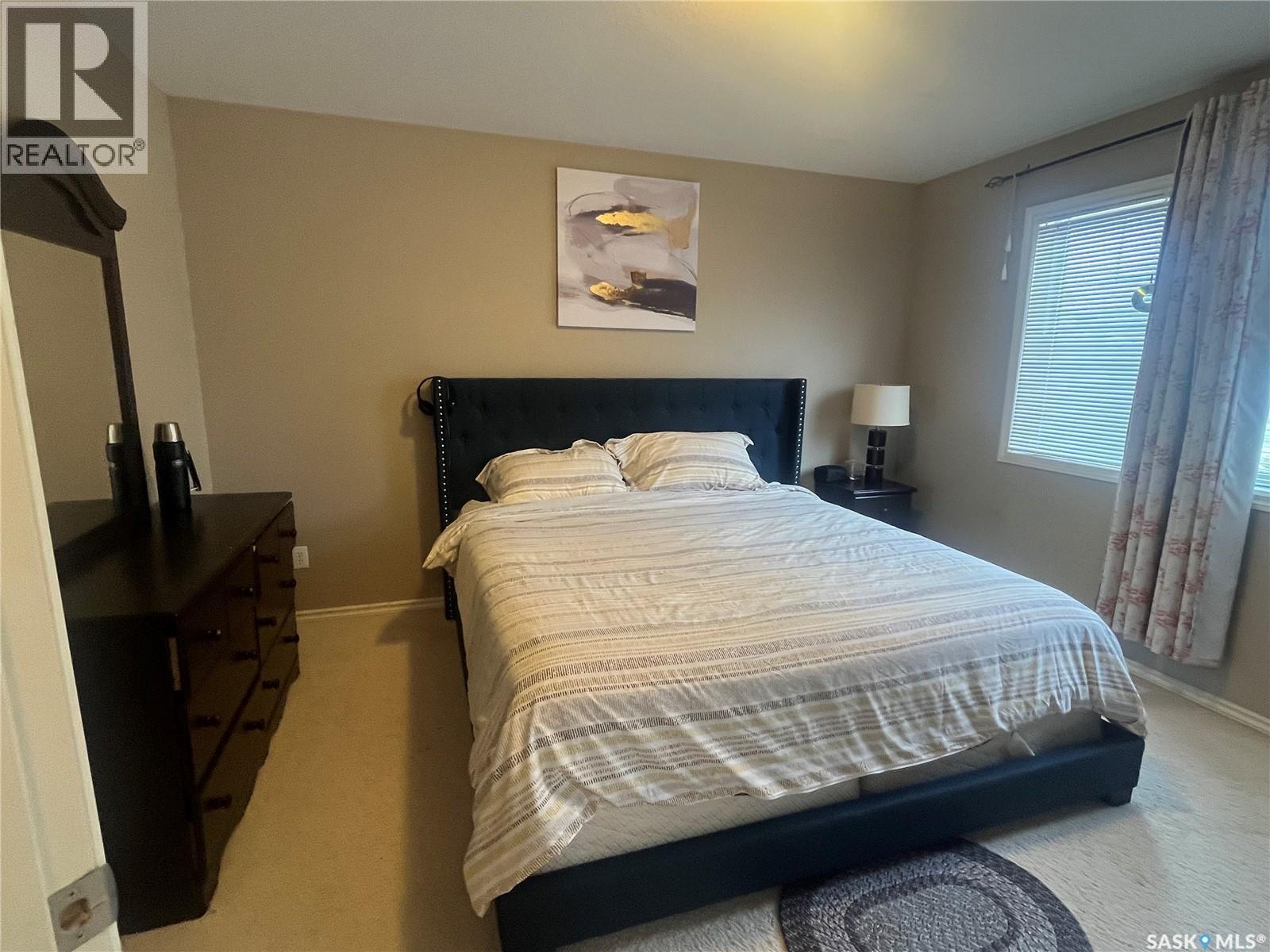 207 303 Slimmon Place, Saskatoon, SK - Indoor Photo Showing Bedroom