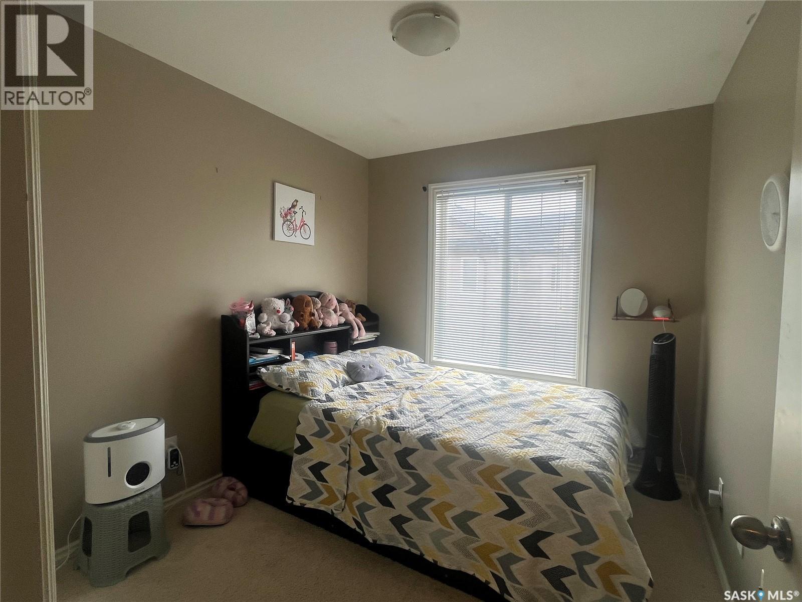 207 303 Slimmon Place, Saskatoon, SK - Indoor Photo Showing Bedroom