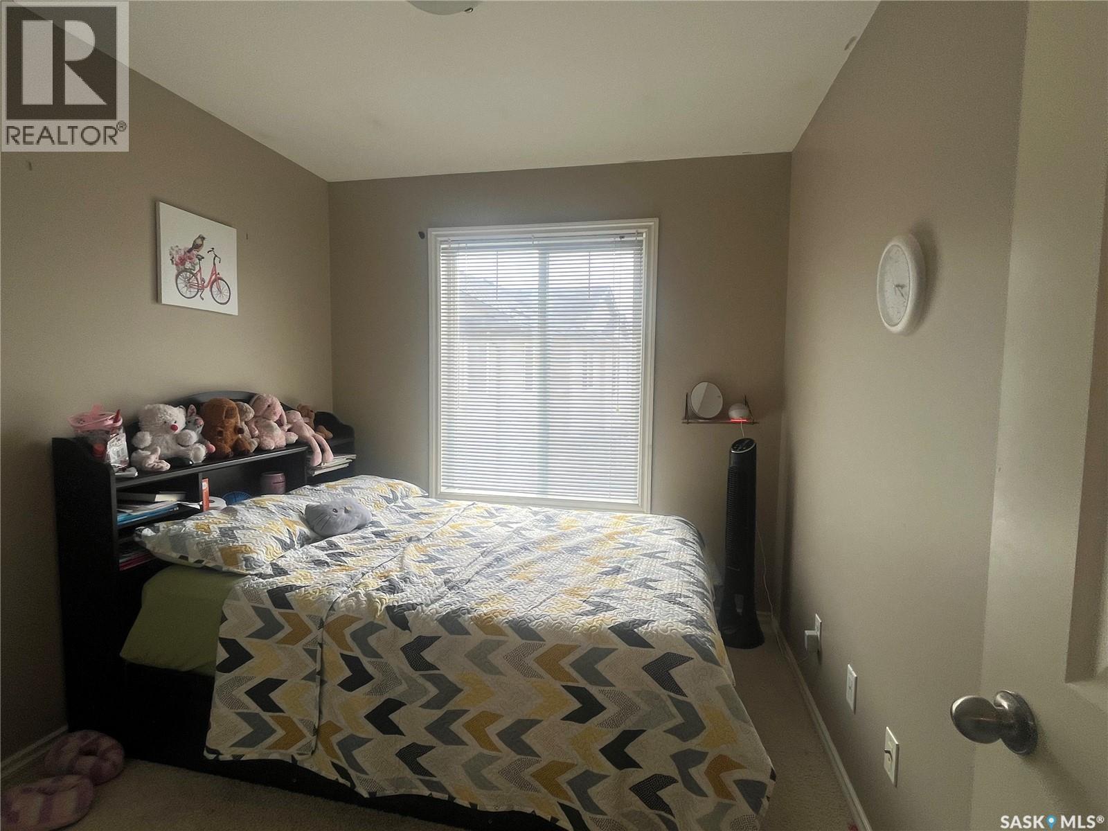 207 303 Slimmon Place, Saskatoon, SK - Indoor Photo Showing Bedroom