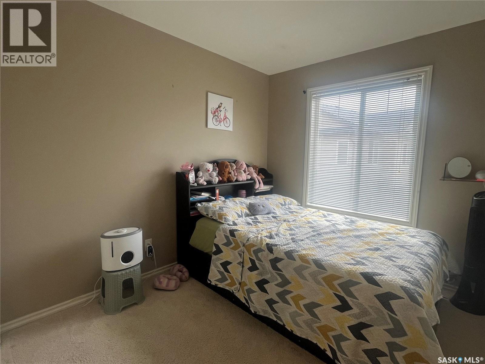 207 303 Slimmon Place, Saskatoon, SK - Indoor Photo Showing Bedroom