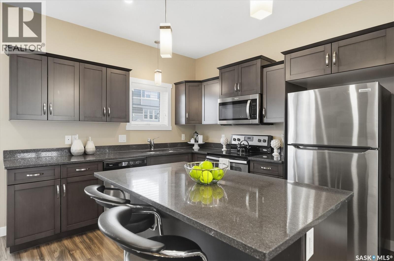 1216 Pringle Way, Saskatoon, SK - Indoor Photo Showing Kitchen With Double Sink