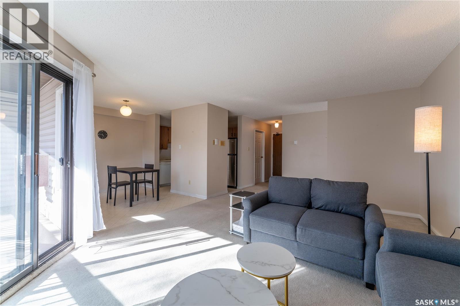 303 302 Tait Crescent, Saskatoon, SK - Indoor Photo Showing Living Room