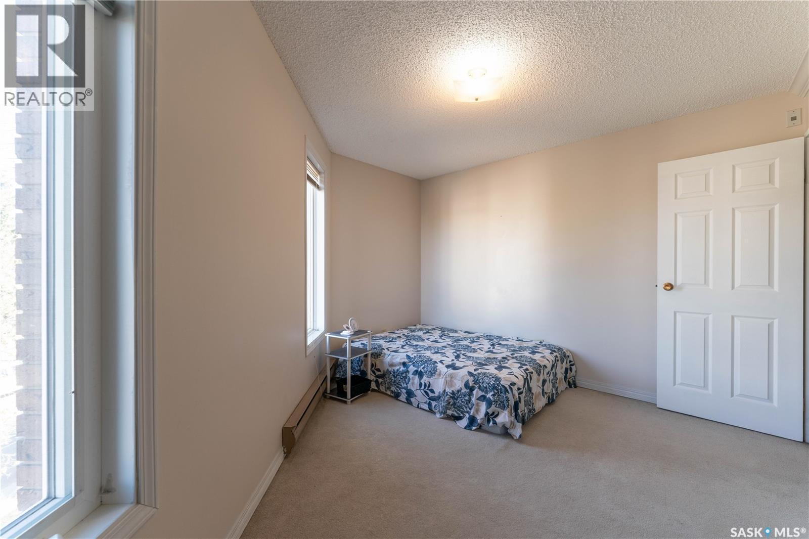 303 302 Tait Crescent, Saskatoon, SK - Indoor Photo Showing Bedroom