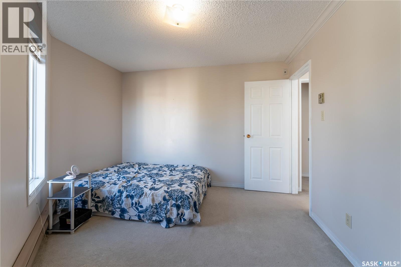 303 302 Tait Crescent, Saskatoon, SK - Indoor Photo Showing Bedroom