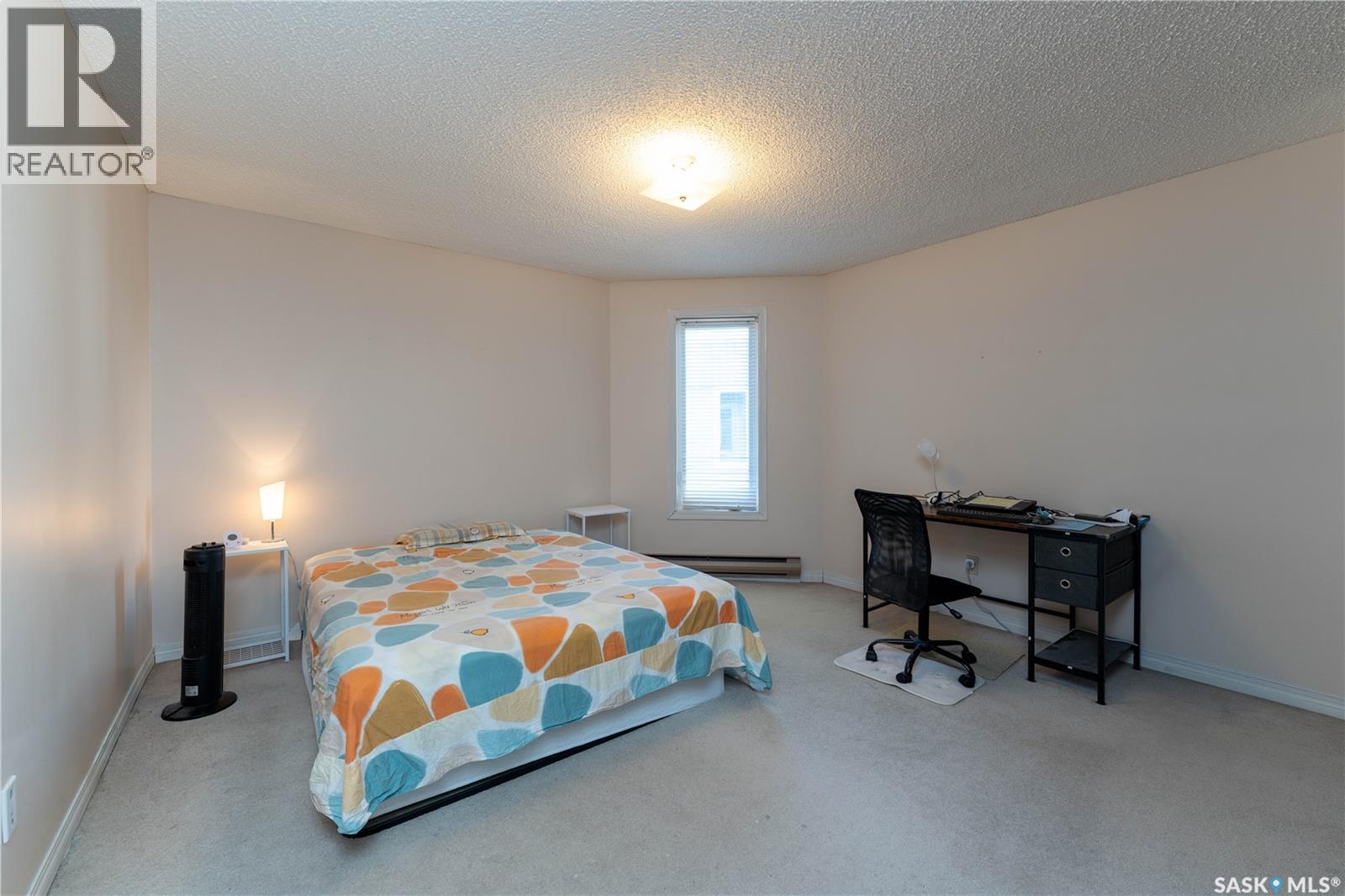 303 302 Tait Crescent, Saskatoon, SK - Indoor Photo Showing Bedroom