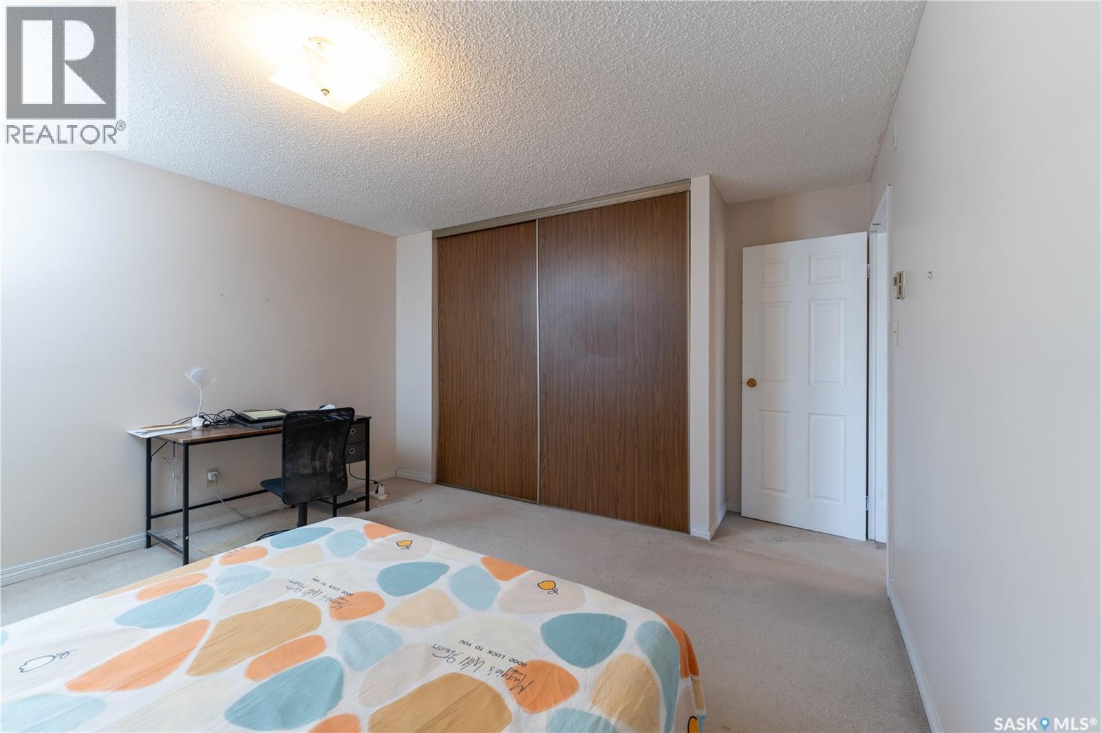 303 302 Tait Crescent, Saskatoon, SK - Indoor Photo Showing Bedroom