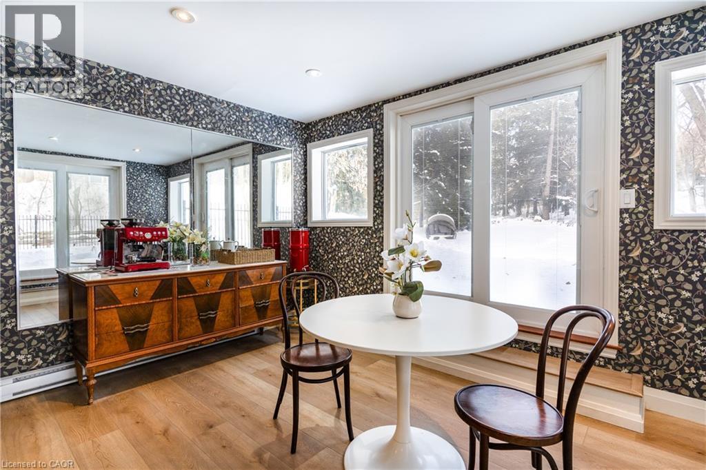 Sunroom with direct access to pool - 3 Fallsview Road, Hamilton, ON - Indoor Photo Showing Dining Room