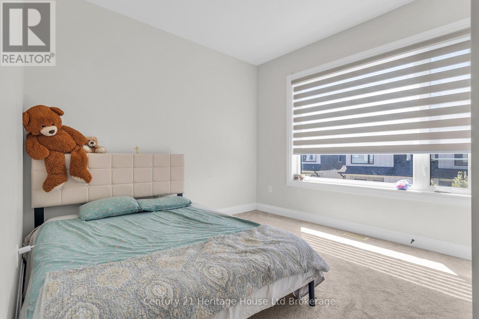 102 - 360 Quarter Town Line, Tillsonburg, ON - Indoor Photo Showing Bedroom