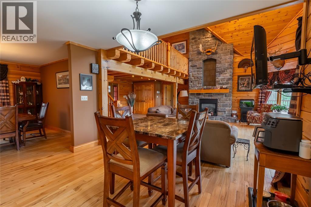 2507 Bickford Line, St Clair, ON - Indoor Photo Showing Dining Room With Fireplace