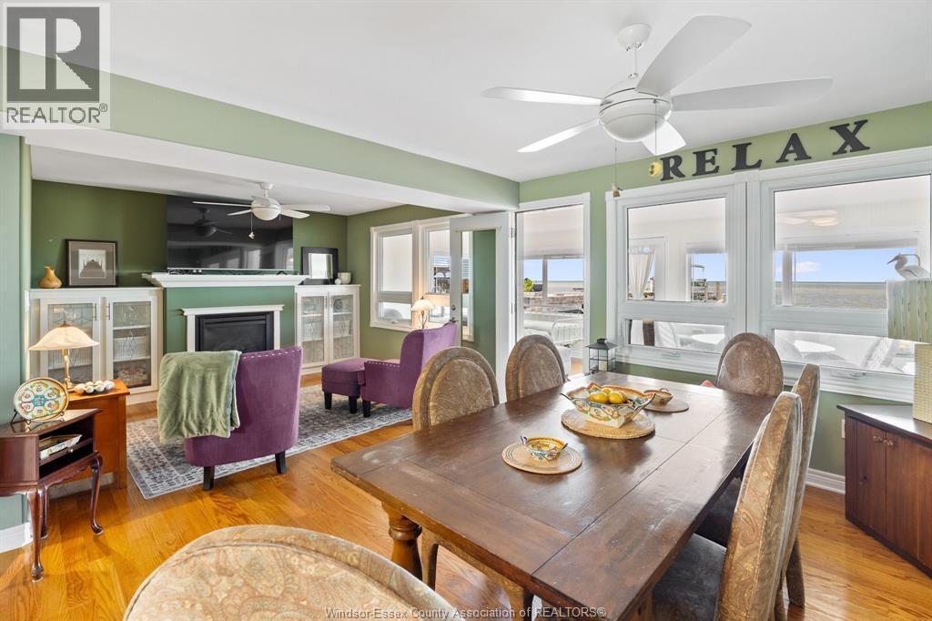 689 Ross Beach, Lakeshore, ON - Indoor Photo Showing Dining Room With Fireplace