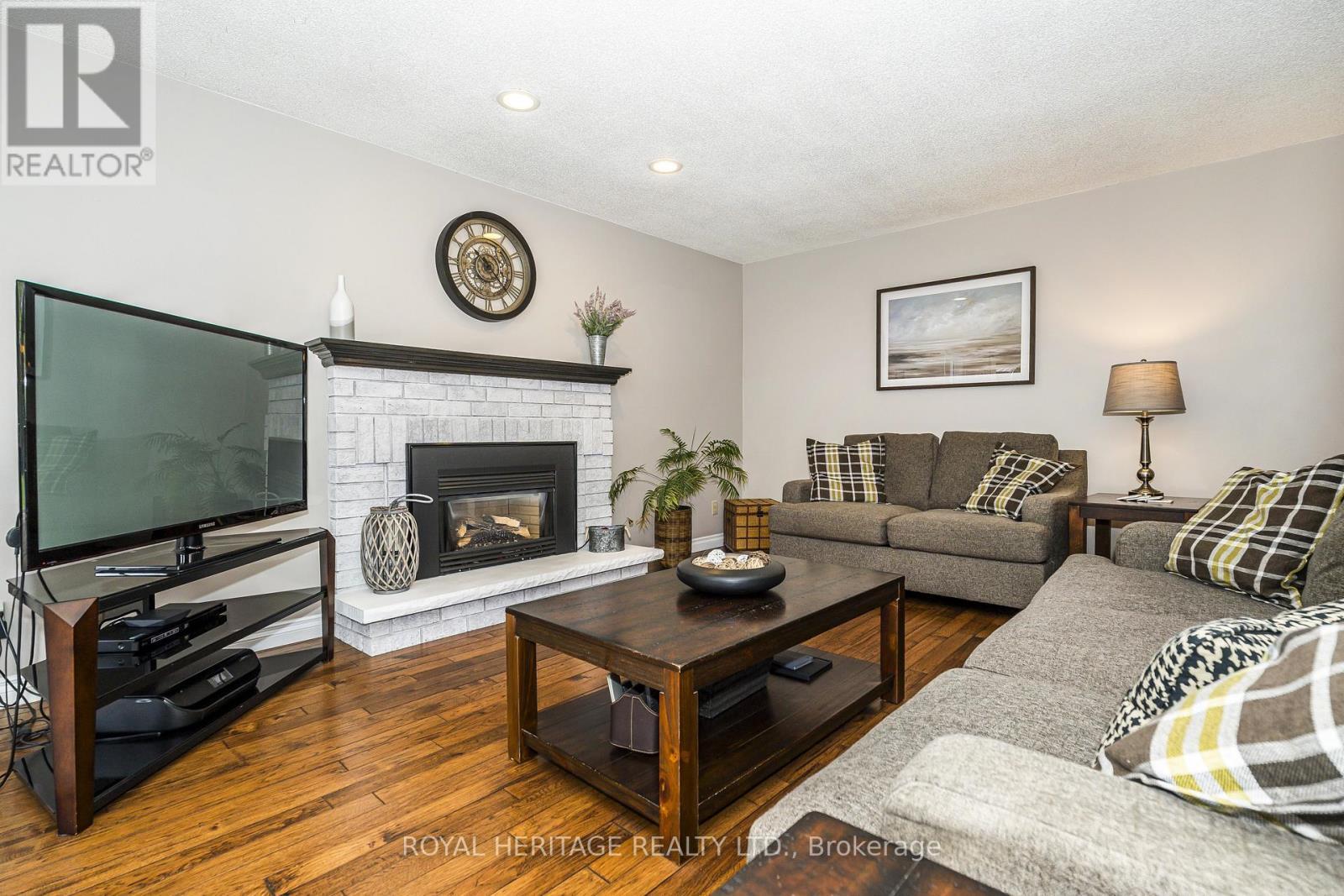 Familyroom - 525 Sundown Crescent, Pickering, ON - Indoor Photo Showing Living Room With Fireplace